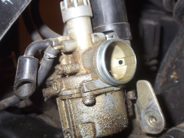 Throw it in the  dishwasher  then sandblast it  and it will be better than new  and forget that carb cleaner I just use windex and varnish to shine it up .