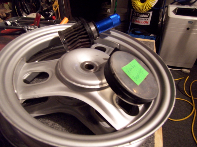 Here is my what to get today pile in the round case is the old bearings  and the blue  harbor frieght  flashlight tube will connect my air cleaner , I hope .