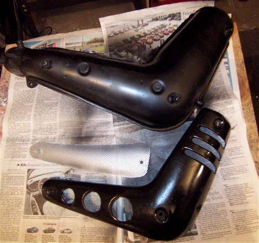 cut a metal screen  to fit .Jammed the screws in done .