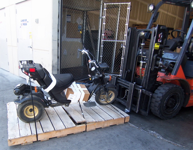 Pick up at the shippers dock /Yes I left the gas and battery in the scooter when it was shipped . Yes I told them  the battery  and gas was removed .Hey it made it to Vegas ...