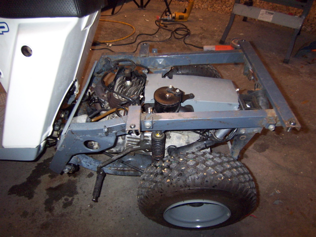 The gray box is the muffler cover